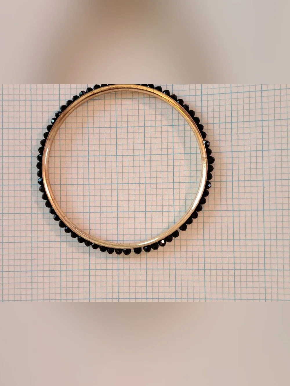 Gold-Tone Eternity Bangle Bracelet with Black Crystal Row